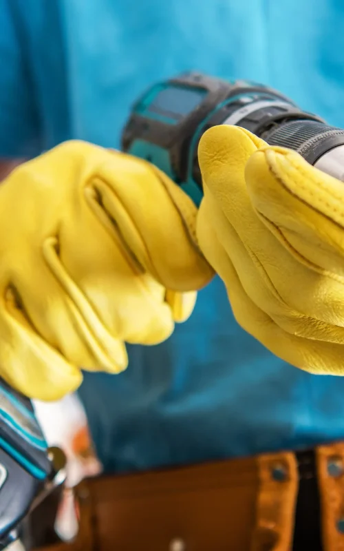 working-with-electrical-drill--min